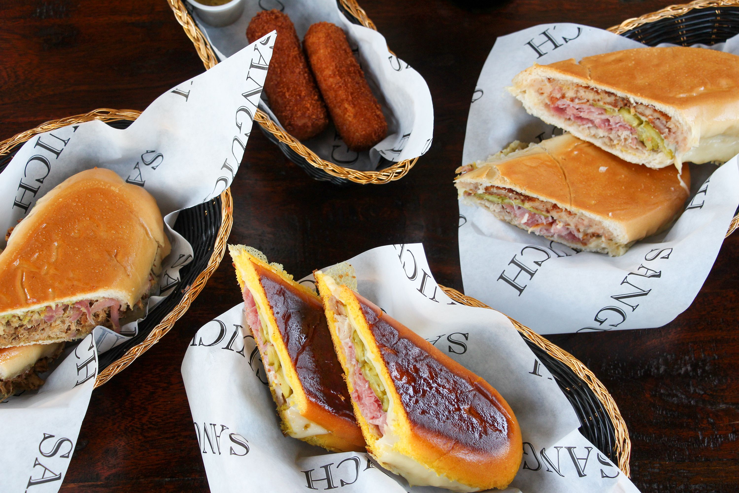 Sanduíches cubanos do restaurante Sanguich de Miami, na área de Little Havana • Divulgação