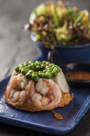 Cuscuz com camarões, palmito e ervilha do Amadeus • Divulgação Amadeus